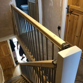pine and chrome bannister