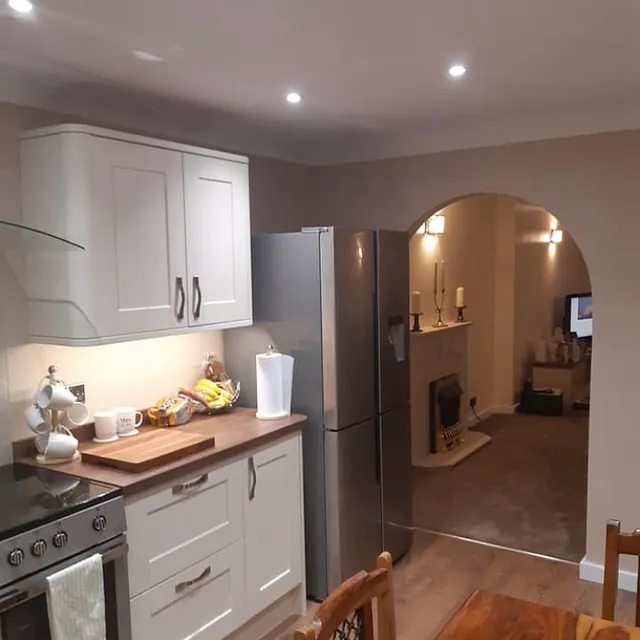 Cream kitchen with oak top 