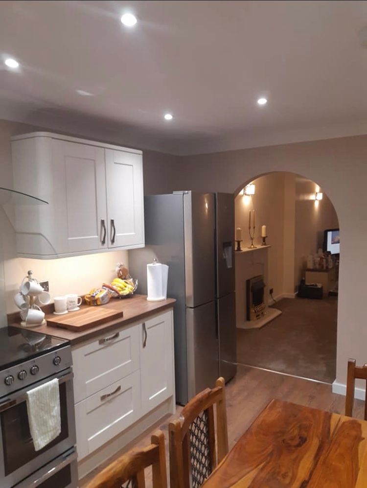 Cream kitchen with oak top 